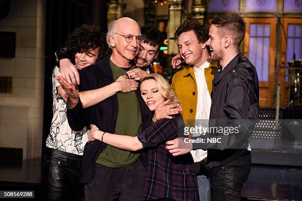 Larry David" Episode 1695 -- Pictured: Matthew Healy, Ross MacDonald, George Daniel, and Adam Hann of musical guest The 1975 surround actor Larry...