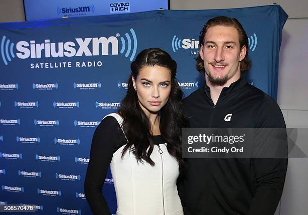 Model Adriana Lima and Ohio State University defensive player Joey Bosa visit the SiriusXM set at Super Bowl 50 Radio Row at the Moscone Center on...