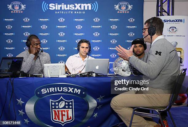 Former NFL player and head coach Jim Harbaugh visits sportscaster Bob Papa and former NFL players Shannon Sharpe (far left0 and Steve Smith Sr. At...