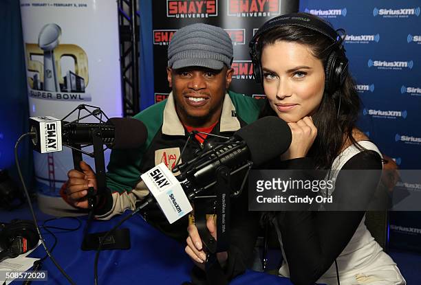 Model Adriana Lima visits SiriusXM host Sway Calloway at the SiriusXM set at Super Bowl 50 Radio Row at the Moscone Center on February 5, 2016 in San...