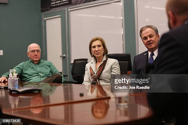 Republican presidential candidate Carly Fiorina and her husband sit with members of the leadership team at Dyn, a cloud-based Internet Performance...