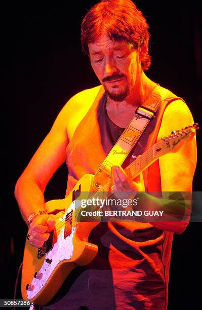 British singer Chris Rea performs on stage, 19 May 2004 at the Cigale theatre in Paris. AFP PHOTO BERTRAND GUAY