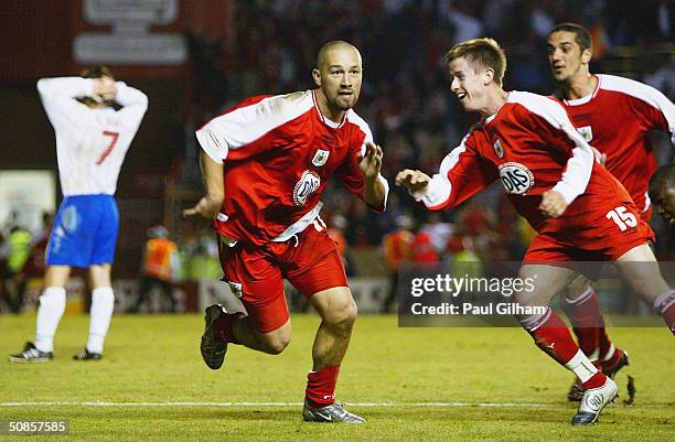 Christian Roberts of Bristol City celebrates with Marc Goodfellow and Scott Murray after scoring the winning goal during the second leg of the...