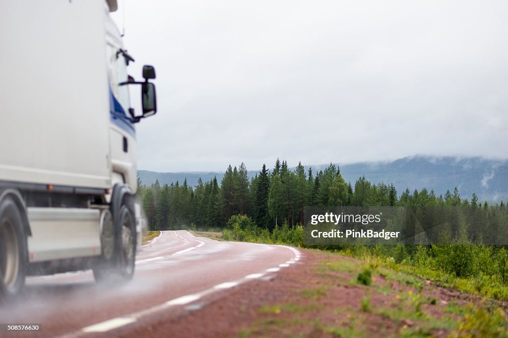 Truck on wet road