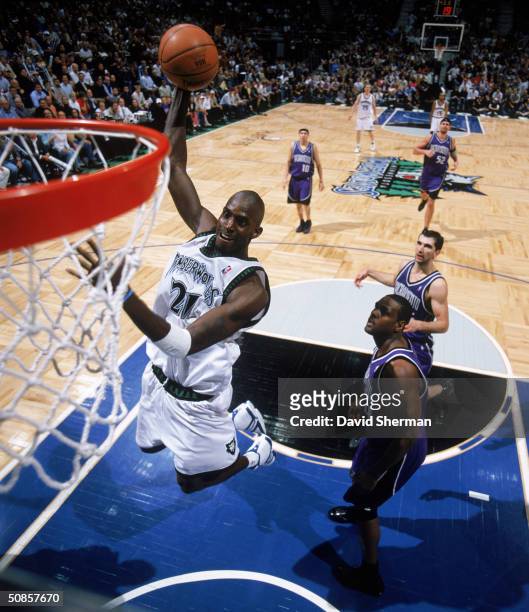 Kevin Garnett of the Minnesota Timberwolves goes for a dunk in Game Five of the Western Conference Semifinals against the Sacramento Kings during the...