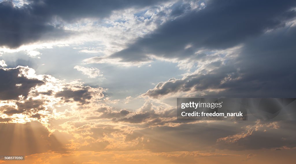 Colorful dramatic sky with cloud at sunset