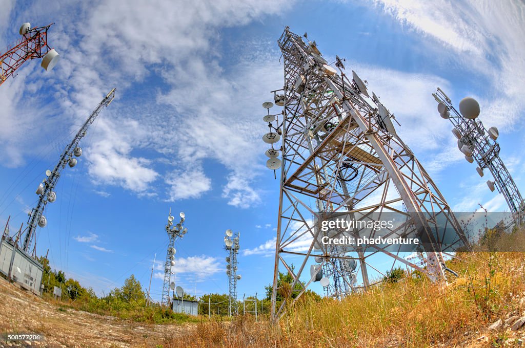 Communication antenna towers in fish-eye perspective