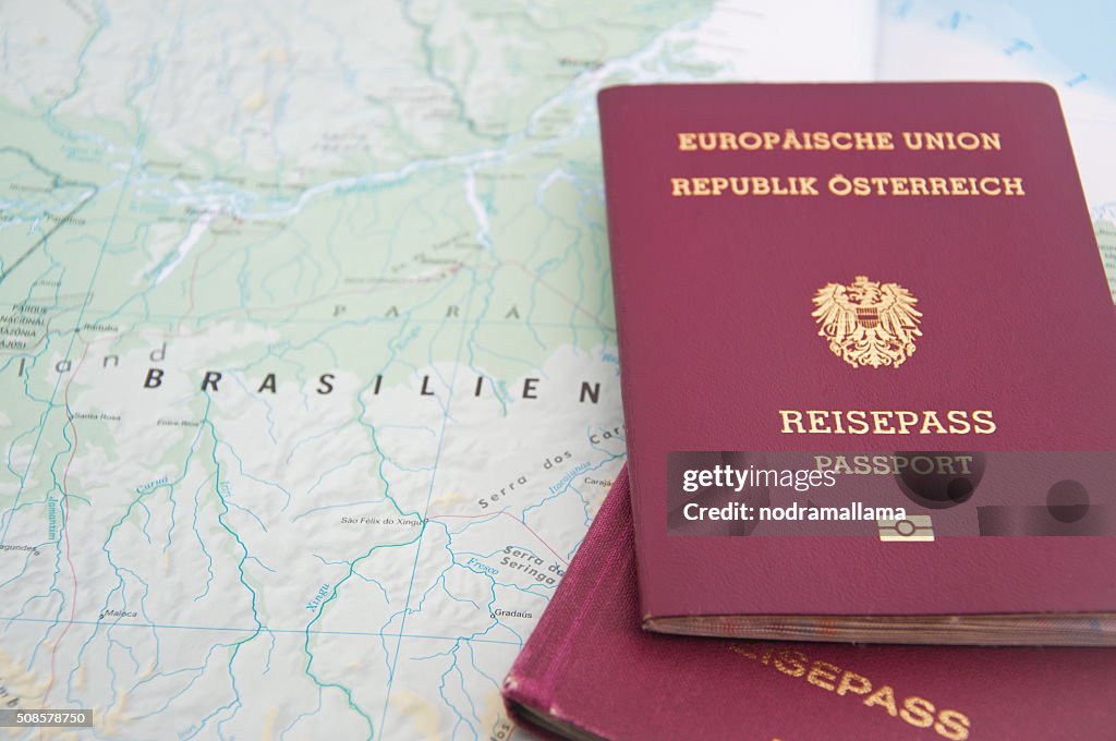Close Up of Passport and map of Brazil.