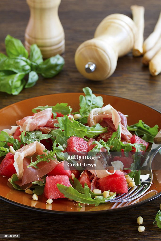 Summer salad with water-melon and prosciutto.