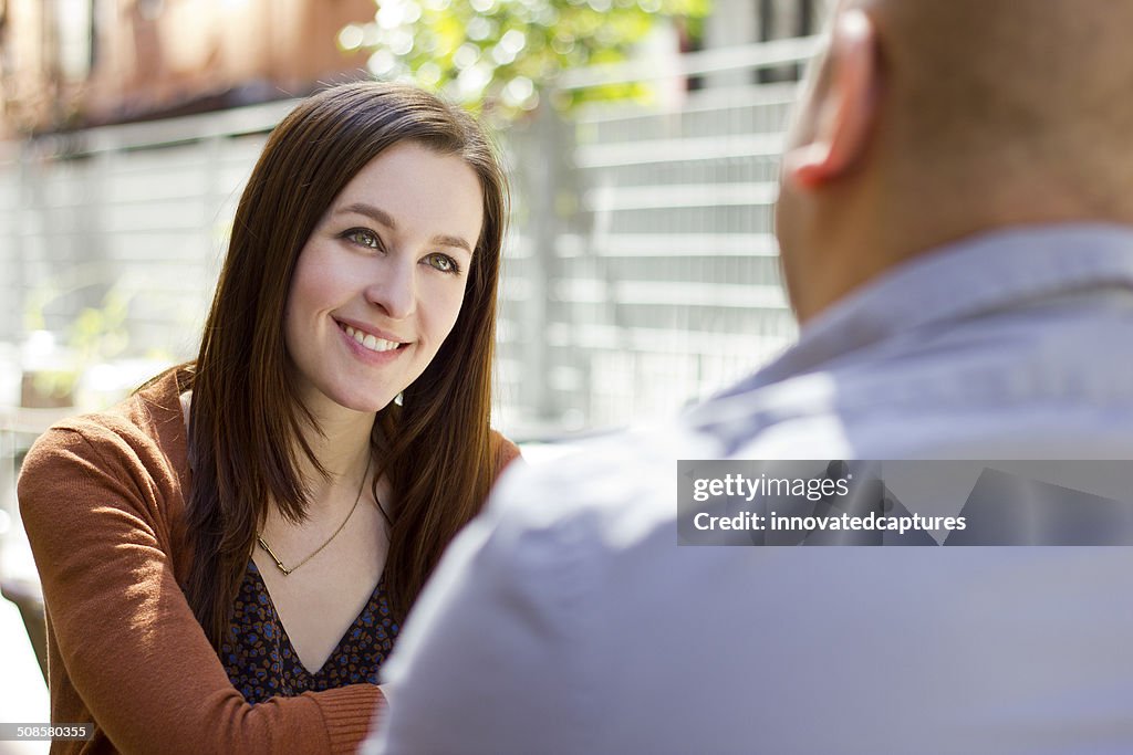 Interracial Couple on a First Date Outdoors