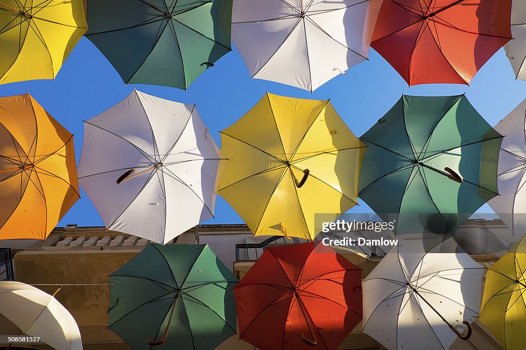 Several colorful umbrella