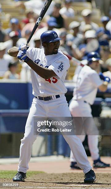 Outfielder Juan Encarnacion of the Los Angeles Dodgers waits for the Montreal Expos pitch during the game at Dodger Stadium on May 2, 2004 in Los...