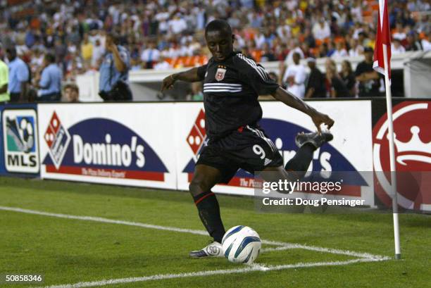 Freddy Adu of DC United takes a corner kick against the Los Angeles Galaxy as the Galaxy defeated United 4-2 during MLS action at RFK Stadium on May...