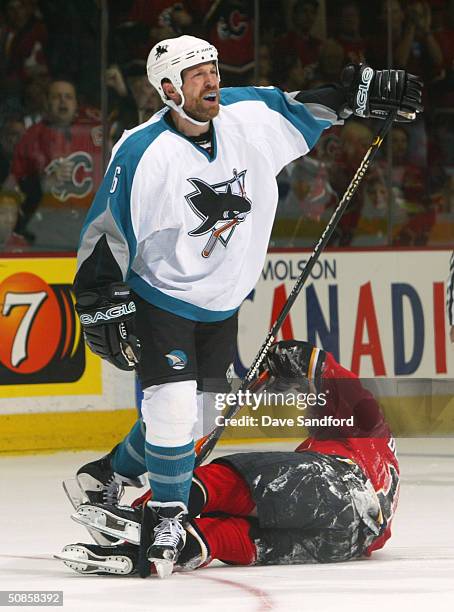 Jason Marshall of the San Jose Sharks reacts after taking a penalty for holding on Shean Donovan of the Calgary Flames during Game six of the Western...