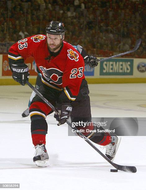 Martin Gelinas of the Calgary Flames breaks away and scores against the San Jose Sharks in Game six of the 2004 NHL Western Conference Finals during...