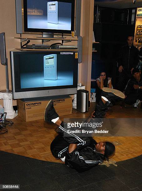 Breakdancer from the Dynasty Rockers performs at the ISkin and DataVision launch event May 19, 2004 in New York City.