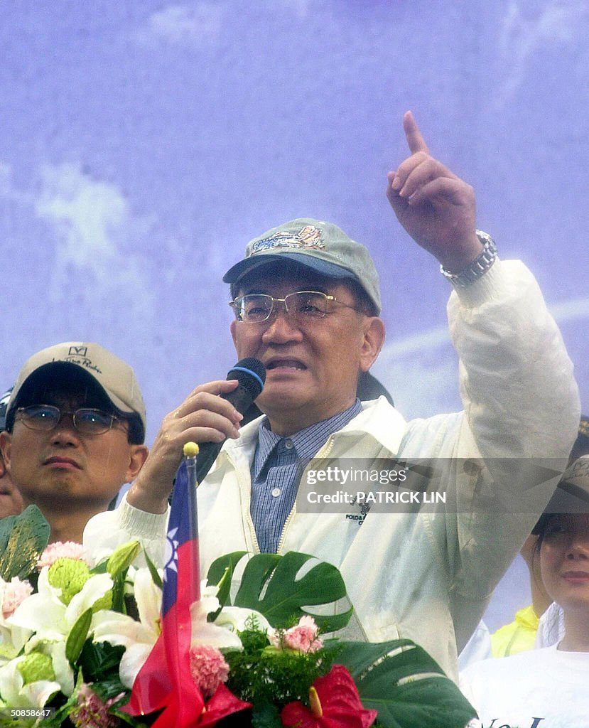 Taiwan opposition leader Lien Chan gestu