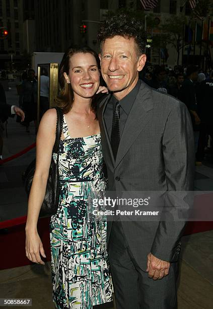 Singer Lyle Lovett and girlfriend April Kimble attend the Rockefeller Center Motorcycle Show Opening Night Bash May 19, 2004 in New York City.