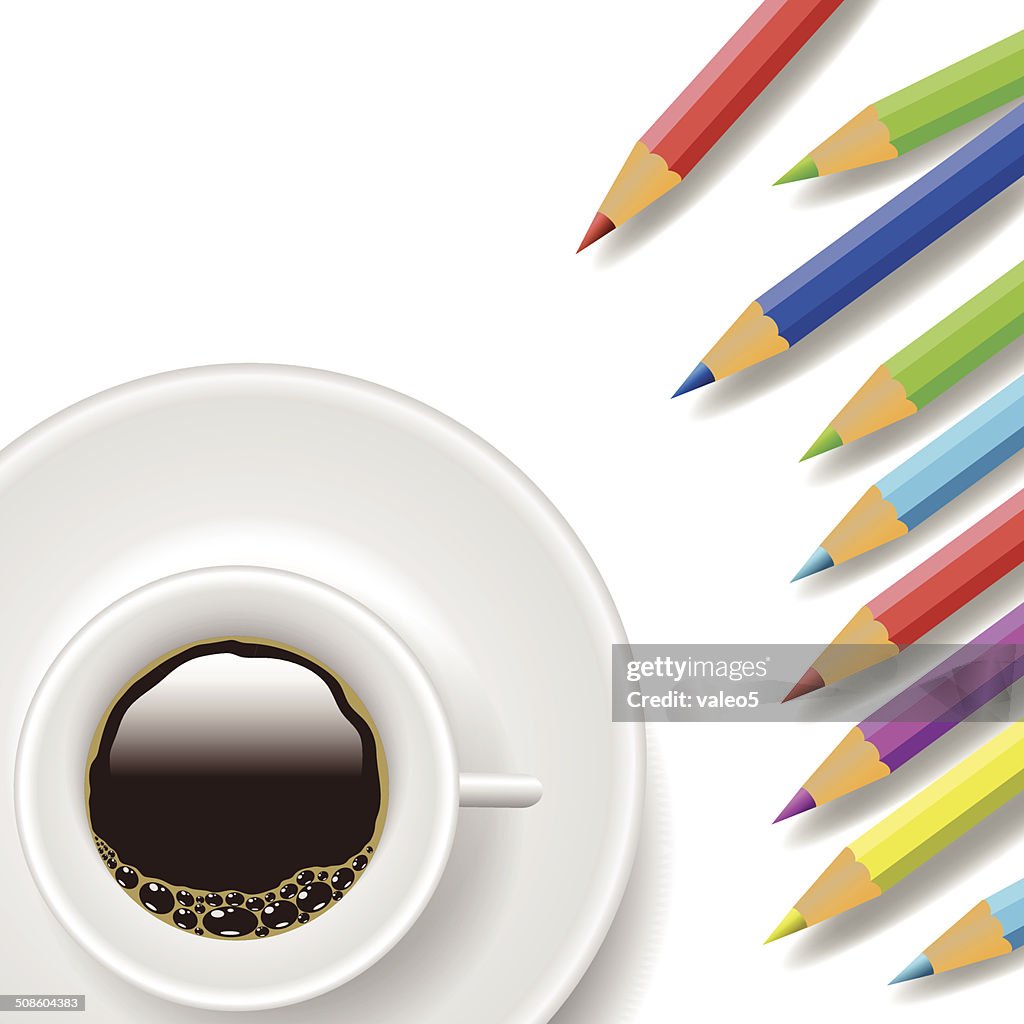 Coffee cup and pencils