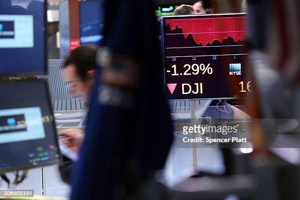 Traders work on the floor of the New York Stock Exchange on February 5, 2016 in New York City. Despite the U.S. Unemployment rate dropping to 4.9...