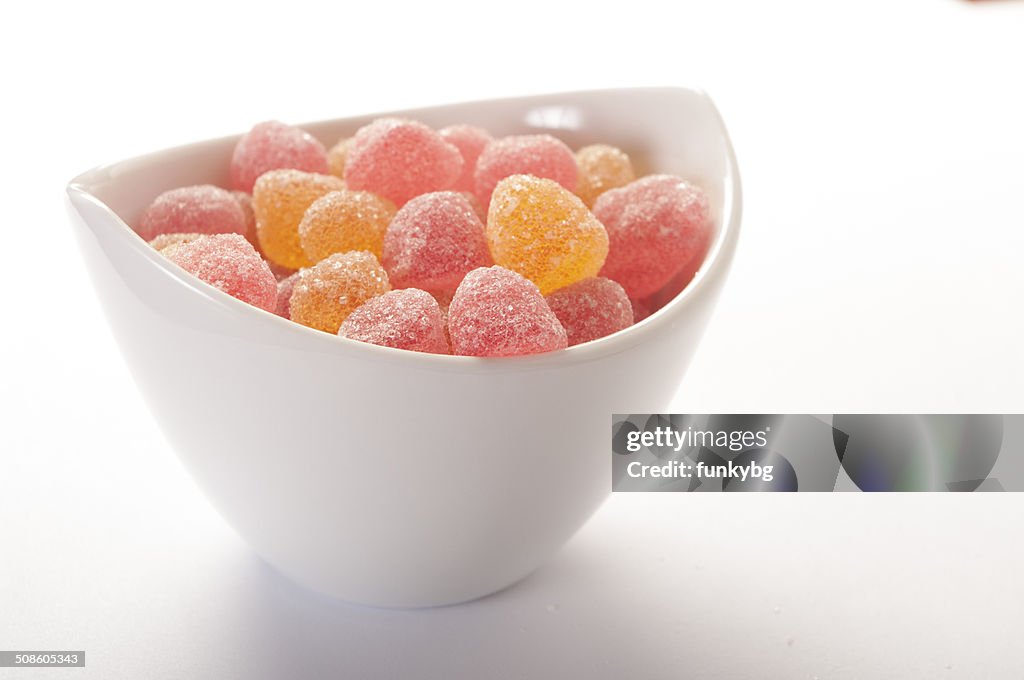 Delicious colorful jelly candy on a white background