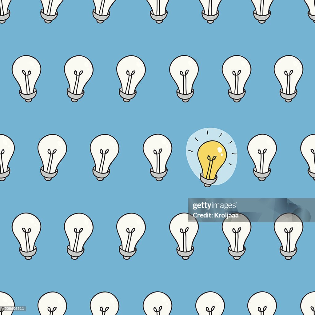 Hand drawn seamless pattern of light bulbs. Idea symbol.