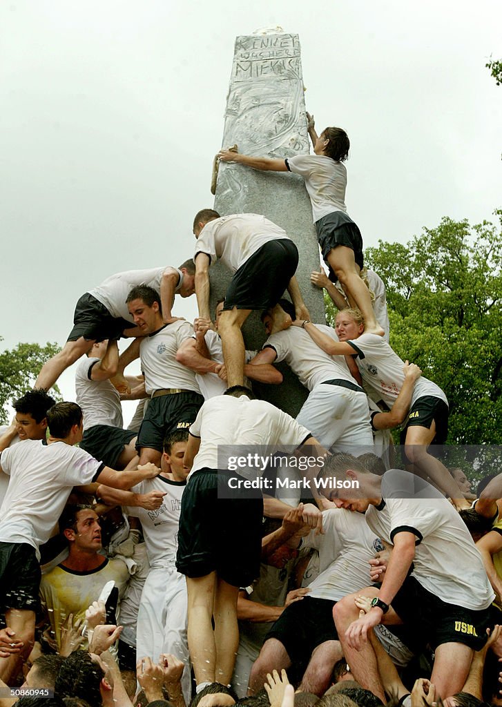 Annapolis Incoming Freshmen Climb Grease Covered Monument