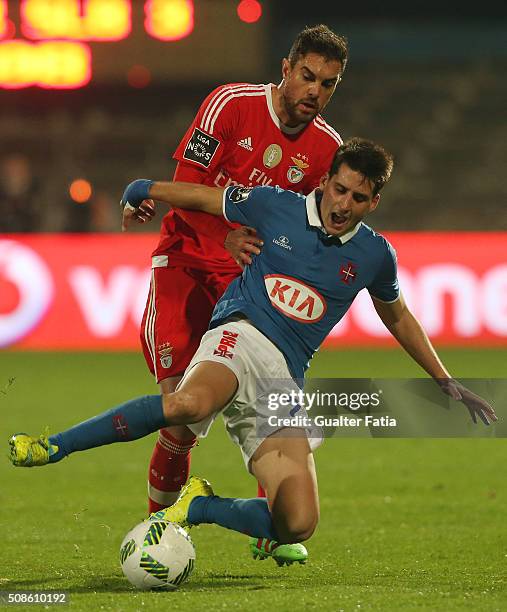 Os Belenenses' forward from Spain Juanto Ortuno with SL Benfica's defender from Brazil Jardel in action during the Primeira Liga match between Os...