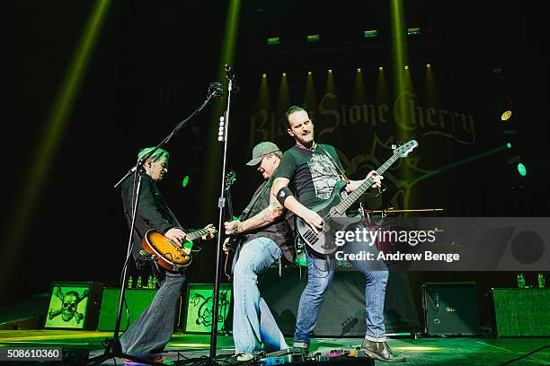 Ben Wells, Chris Robertson and Jon Lawhon of Black Stone Cherry perform at First Direct Arena on February 5, 2016 in Leeds, England.