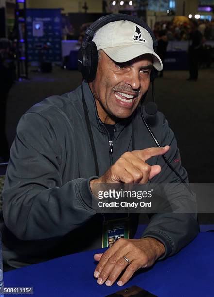 Former NFL player and head coach Herman Edwards visits the SiriusXM set at Super Bowl 50 Radio Row at the Moscone Center on February 5, 2016 in San...