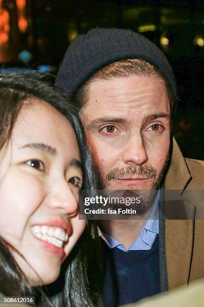 Daniel Bruehl with a fan during the 'Colonia Dignidad - Es gibt kein zurueck' Berlin Premiere on February 05, 2016 in Berlin, Germany.