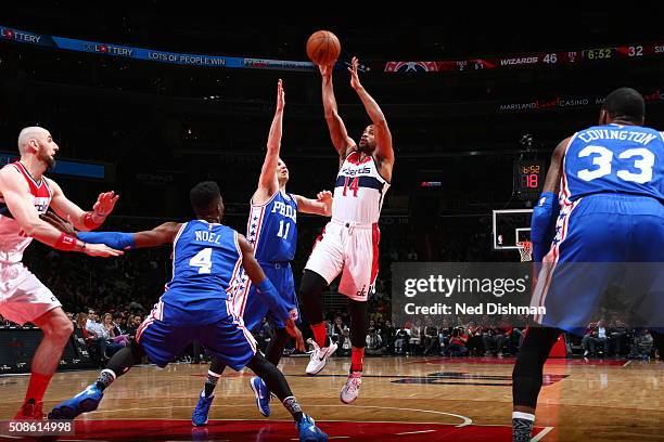 Gary Neal of the Washington Wizards shoots against Nik Stauskas of the Philadelphia 76ers on February 5, 2016 at Verizon Center in Washington, DC....