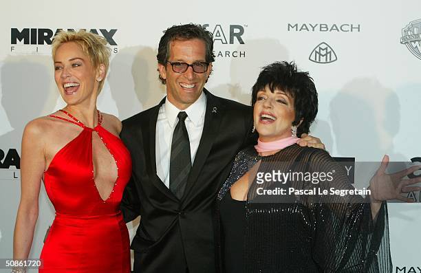 Actress Sharon Stone, wearing Chopard jewelry, designer Kenneth Cole and actress Liza Minnelli arrive at "Cinema Against AIDS 2004", the 11th annual...