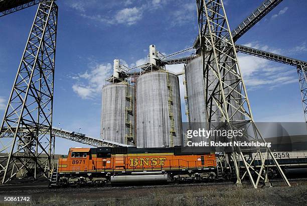 Car train from the Burlington Northern Santa Fe company moves slowly through a coal loading silo in the Buckskin Coal Mine May 6 12 miles north of...
