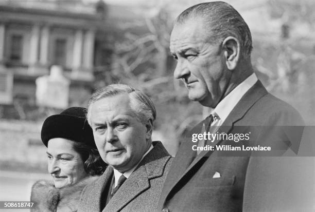 British Labour Party politician and Prime Minister, Harold Wilson with President Lyndon B. Johnson and his wife, Lady Bird Johnson , USA, 1964.