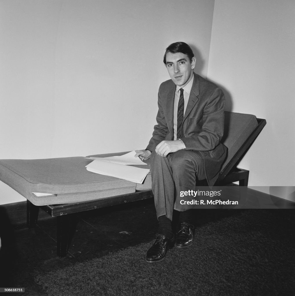 Peter Cook Rare English actor, satirist, writer and comedian, Peter Cook poses in a ...