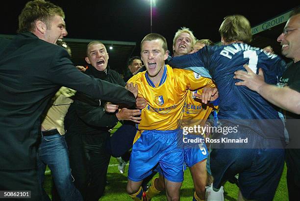 Colin Larkin of Mansfield celebrates after scoring the winning penalty during the Nationwide Division Three Play Off Semi Final, Second Leg between...