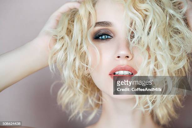 beautiful woman with stylish hairstyle - beautiful woman and eyeshadow stock pictures, royalty-free photos & images