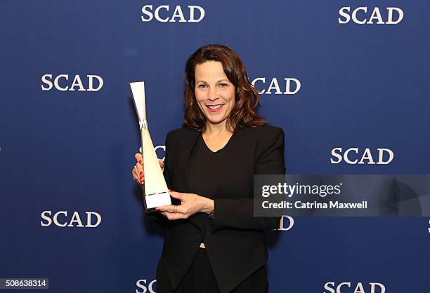 Actress Lili Taylor poses with her Icon award during Icon Award & Spotlight Cast Award Presentations during aTVfest 2016 presented by SCAD on...