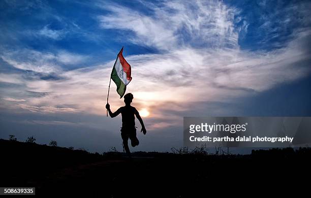 boy running with indian flag - bengali flag stock pictures, royalty-free photos & images
