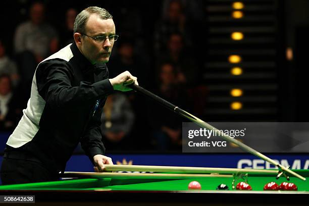 Martin Gould of England plays a shot during the quarter finals match against Judd Trump of England on day three of German Masters 2016 at Tempodrom...