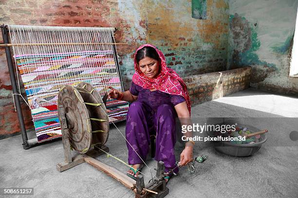 indian women weaving textile (durry). - rural scene stock pictures, royalty-free photos & images