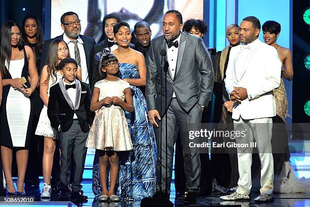 Producer Kenya Barris and cast members including Anthony Anderson accept the award for Oustanding Comedy Series for "Black-ish" onstage during the...