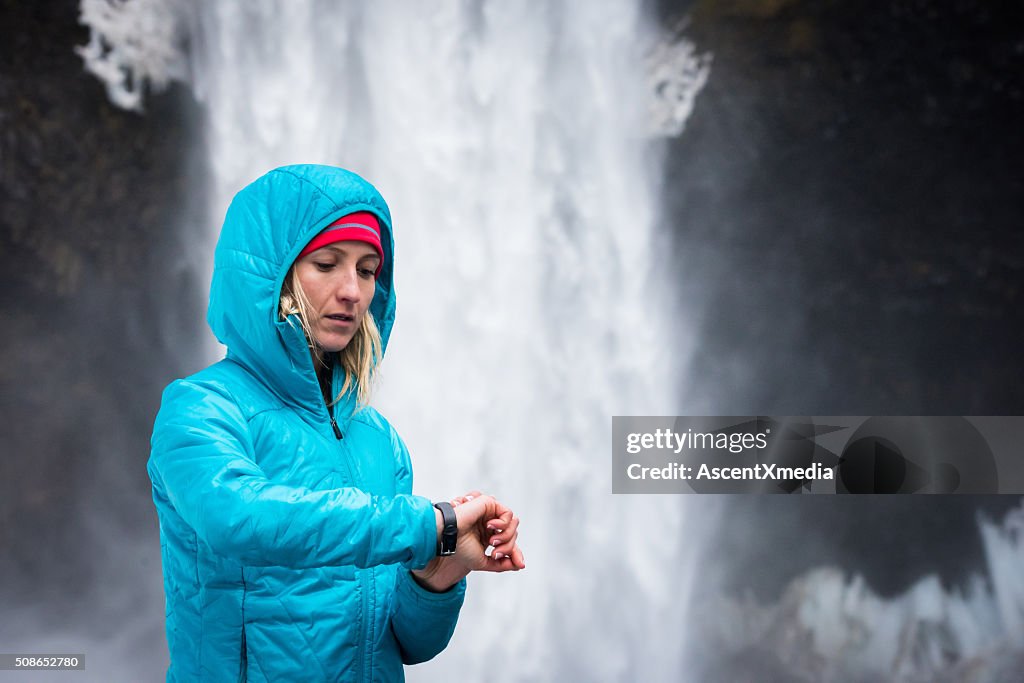 Woman using a fitness monitor