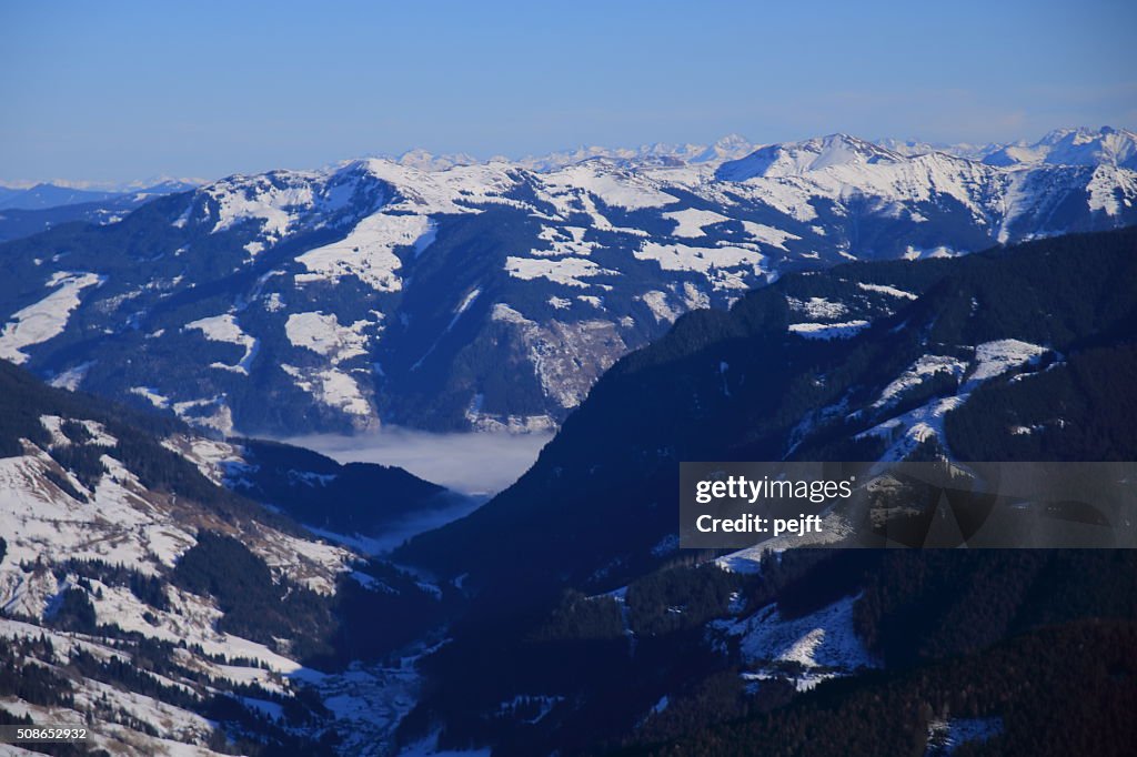 Saalbach, Austria at winter time above the clouds