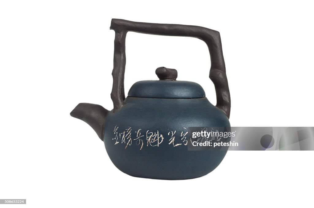 Isolated chinese teapot.