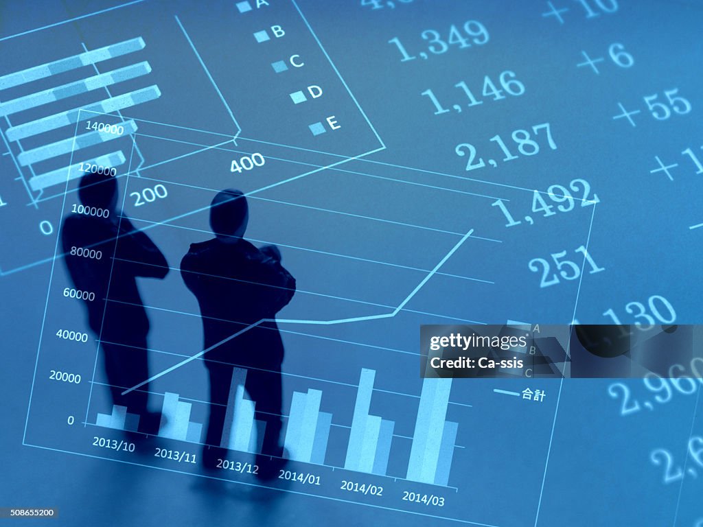 Financial graphs analysis and Businessman