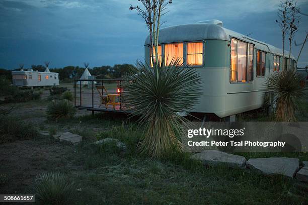 Trailer and teepee camping at night at The El Cosmico campground in Marfa, Texas in 2014