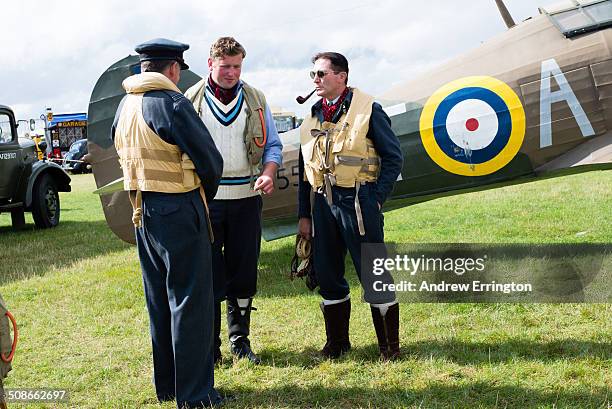 Kent, Headcorn Military Airshow, men taking part in history re-enactment of Second World War, dressed up as Battle of Britain Fighter Pilots,...