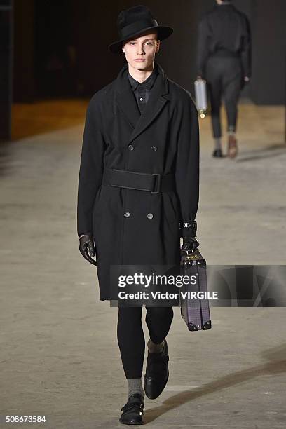 Model walks the runway at the Robert Geller show during New York Fashion Week Men's Fall/Winter 2016 on February 2, 2016 in New York City.